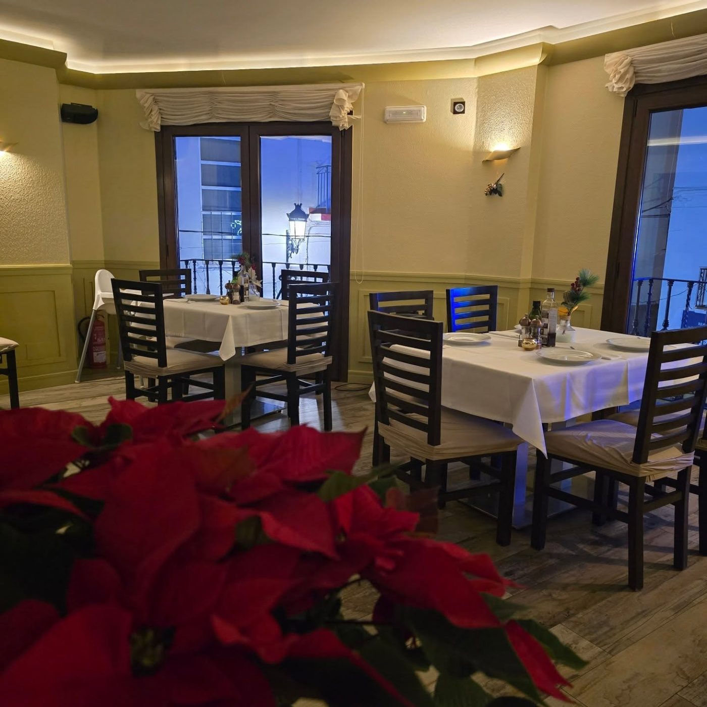 Tables laid in Jocavi's dining room